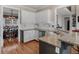 Kitchen featuring granite countertops, stainless steel appliances, and breakfast bar at 355 Parker Rd, Covington, GA 30014
