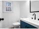 Cozy bathroom features a modern sink, a large mirror and stylish fixtures at 3569 Vinyard Way, Lawrenceville, GA 30044