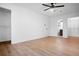 Main bedroom suite featuring laminate floors, access to a bathroom and walk-in closets at 3569 Vinyard Way, Lawrenceville, GA 30044