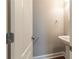 Powder room features a pedestal sink and stylish fixtures at 405 Rabbits Run, Fayetteville, GA 30214