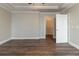 Bedroom with wood floors, neutral paint, closet and ceiling fan at 405 Rabbits Run, Fayetteville, GA 30214