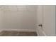 Walk-in closet comes equipped with wire shelving for ample storage at 405 Rabbits Run, Fayetteville, GA 30214