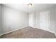 Comfortable bedroom featuring neutral walls and soft carpeting at 540 Ridge View Xing, Woodstock, GA 30188