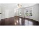Bright and airy living room with gleaming hardwood floors and large windows at 540 Ridge View Xing, Woodstock, GA 30188