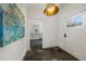 Inviting entryway with tile floors, decorative lighting, and access to the kitchen at 406 Whitmore Nw Dr, Atlanta, GA 30305