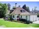Beautiful home featuring a well-maintained lawn and an attached two-car garage at 406 Whitmore Nw Dr, Atlanta, GA 30305