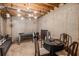 Unfinished basement space featuring exposed beams, a foosball table, a chessboard, and versatile potential at 4630 Smokestone Dr, Douglasville, GA 30135