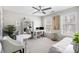 Bright bedroom with a ceiling fan, multiple windows, and a full-sized bed at 4630 Smokestone Dr, Douglasville, GA 30135