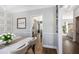 Bright dining area with hardwood floors, stylish decor, and an inviting atmosphere at 4630 Smokestone Dr, Douglasville, GA 30135