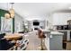 Open floor plan shows the kitchen, dining area, and living room with fireplace and built-ins at 4630 Smokestone Dr, Douglasville, GA 30135