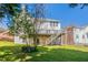 A well-maintained backyard lawn with deck offering privacy and room for outdoor activities at 1602 Allsworth Se Ct, Smyrna, GA 30082