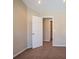Bedroom featuring carpet, neutral paint, and a view to another room through an open door at 1602 Allsworth Se Ct, Smyrna, GA 30082