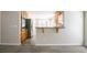 Modern kitchen features stainless appliances and breakfast bar at 1602 Allsworth Se Ct, Smyrna, GA 30082