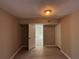 Comfortable bedroom with wood-look flooring and ample closet space, providing a functional and relaxing retreat at 2326 Union Grove Ct, Lithonia, GA 30058