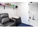 Small bathroom with a shower and an adjacent seating area, offering convenience and comfort at 4955 Day Lily Nw Way, Acworth, GA 30102