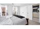 Bedroom with carpeted floors, and access to the ensuite bathroom and closet for convenience at 4955 Day Lily Nw Way, Acworth, GA 30102