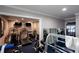 Dedicated home gym with treadmills and weight machines offering a private fitness space at 4955 Day Lily Nw Way, Acworth, GA 30102