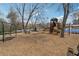Community playground with slides and swings on a mulch ground at 4955 Day Lily Nw Way, Acworth, GA 30102