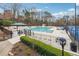 Resort style pool with chairs, greenery and tables at 4955 Day Lily Nw Way, Acworth, GA 30102