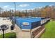 Tennis courts with Flex Leagues sign and bleacher seating at 4955 Day Lily Nw Way, Acworth, GA 30102