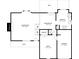 Detailed floor plan showcasing the layout of the living room, dining room, kitchen, den, and garage at 971 Lake Watch Ct, Stone Mountain, GA 30088