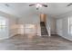 This open-concept living room and staircase creates a welcoming space at 971 Lake Watch Ct, Stone Mountain, GA 30088