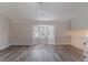 Open and airy upper living room with large bay window and nice floors at 971 Lake Watch Ct, Stone Mountain, GA 30088