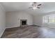 Open living room offers high ceilings, fireplace, and lots of light at 971 Lake Watch Ct, Stone Mountain, GA 30088