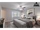 Staged main bedroom featuring a cozy bay window, soft gray walls, and modern floors at 971 Lake Watch Ct, Stone Mountain, GA 30088