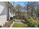 A fenced backyard showing garden beds and a gravel path, perfect for gardening enthusiasts at 1479 Hartford Sw Ave, Atlanta, GA 30310