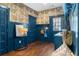 Cozy mudroom with storage, coat hooks, and custom wallpaper at 1479 Hartford Sw Ave, Atlanta, GA 30310