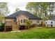 Large backyard with an expansive deck and a storage shed at 2425 River Place Xing, Douglasville, GA 30135