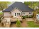 This backyard includes a large deck area perfect for outdoor entertaining and leisure at 2425 River Place Xing, Douglasville, GA 30135