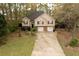 Two-story home featuring a two-car garage and a traditional facade at 2425 River Place Xing, Douglasville, GA 30135