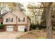 Two-story home featuring a two-car garage and a traditional facade at 2425 River Place Xing, Douglasville, GA 30135