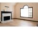 Living room features fireplace and natural light at 2425 River Place Xing, Douglasville, GA 30135