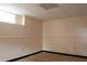 Living room featuring neutral paint, wood floors and black trim at 2425 River Place Xing, Douglasville, GA 30135