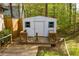Backyard shed with wooden deck at 2425 River Place Xing, Douglasville, GA 30135