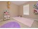 Inviting ' bedroom featuring playful decor and soft carpeting at 114 Connie Dr, Dallas, GA 30157