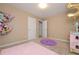 Comfortable ' bedroom with two plush rugs at 114 Connie Dr, Dallas, GA 30157