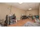 A bedroom with a couch, a lamp, hardwood laminate floors, and a ceiling light at 114 Connie Dr, Dallas, GA 30157