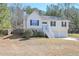 Charming home featuring a traditional design, a two-car garage, and a inviting front yard at 114 Connie Dr, Dallas, GA 30157