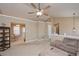 Inviting living room with vaulted ceilings adjacent to the dining and kitchen areas at 114 Connie Dr, Dallas, GA 30157
