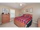 Relaxing main bedroom with a cozy bed and vaulted ceiling at 114 Connie Dr, Dallas, GA 30157