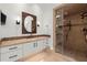Bathroom featuring an oversized shower with updated fixtures, granite countertops, and custom vanity at 303 Rolling Rock Se Rd, Marietta, GA 30067