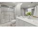 Bathroom featuring a glass-enclosed shower, sleek vanity, and modern fixtures at 303 Rolling Rock Se Rd, Marietta, GA 30067