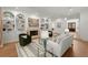 Elegant living room with fireplace, hardwood floors, and custom built-ins at 303 Rolling Rock Se Rd, Marietta, GA 30067