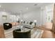 Spacious living room with hardwood floors and an open floor plan at 303 Rolling Rock Se Rd, Marietta, GA 30067