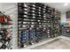 Well-organized wine cellar featuring a wall-mounted rack that neatly displays a variety of wine bottles at 303 Rolling Rock Se Rd, Marietta, GA 30067