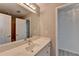 Bright bathroom with double closets, marble countertops, and modern faucet at 4852 Jacobs Cove Pt, Buford, GA 30519